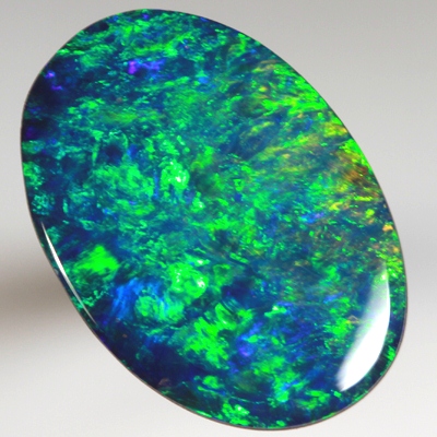 TOP QUALITY LIGHTNING RIDGE OPAL DOUBLET Golden greens over deep blue SEE VIDEO
